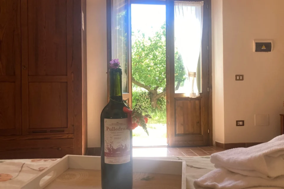 Camera Pitigliano - Ingresso dal letto